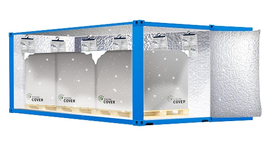 A blue shipping container with pallets covered in silver thermal blankets and insulation lining the interior walls and door, with temperature-monitoring devices hanging from the ceiling.